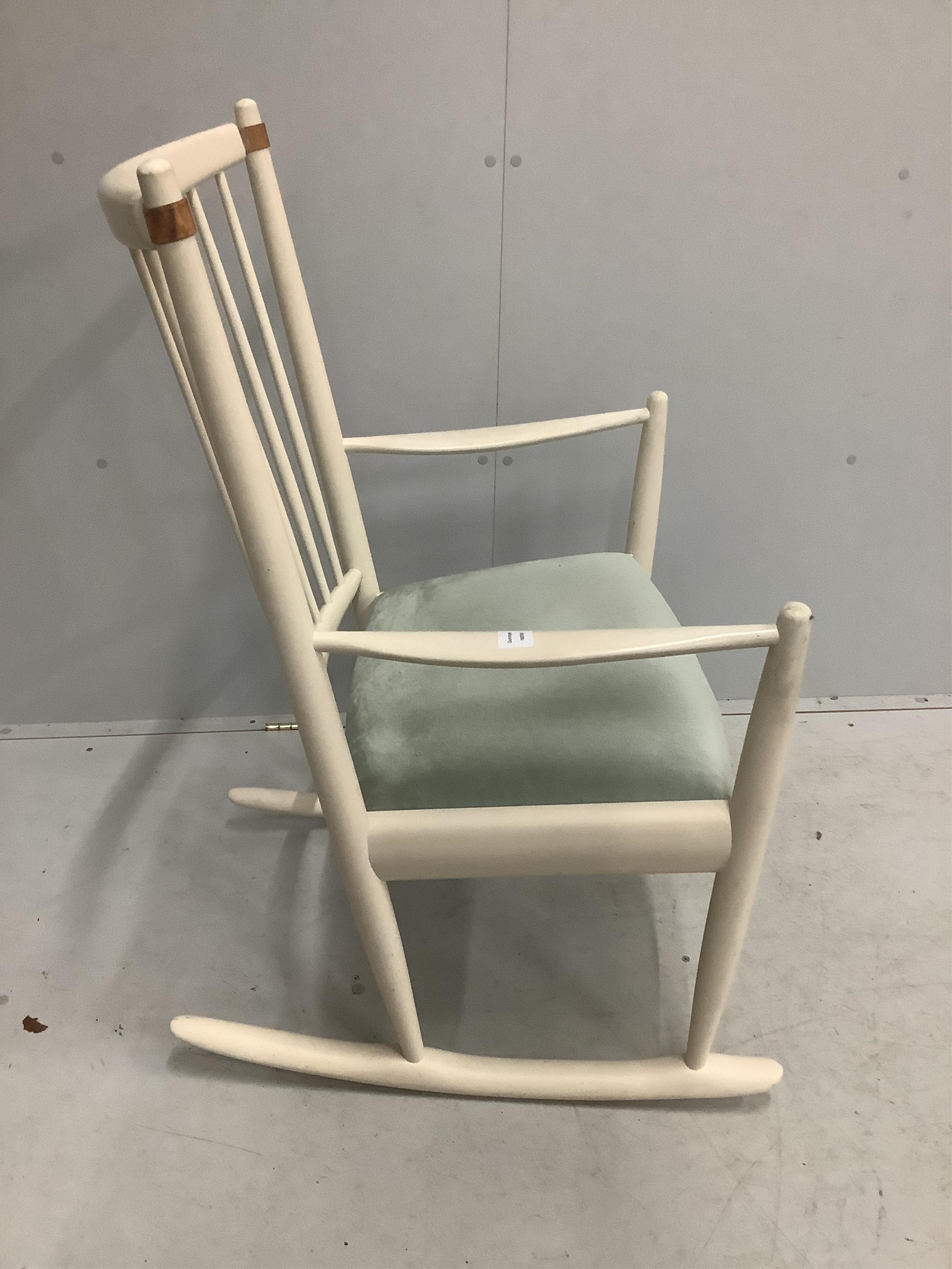 Niels Eilersen. A white painted rocking chair, width 64cm, depth 44cm, height 100cm. Condition - fair